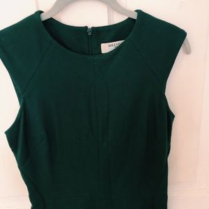 Deep emerald green business dress